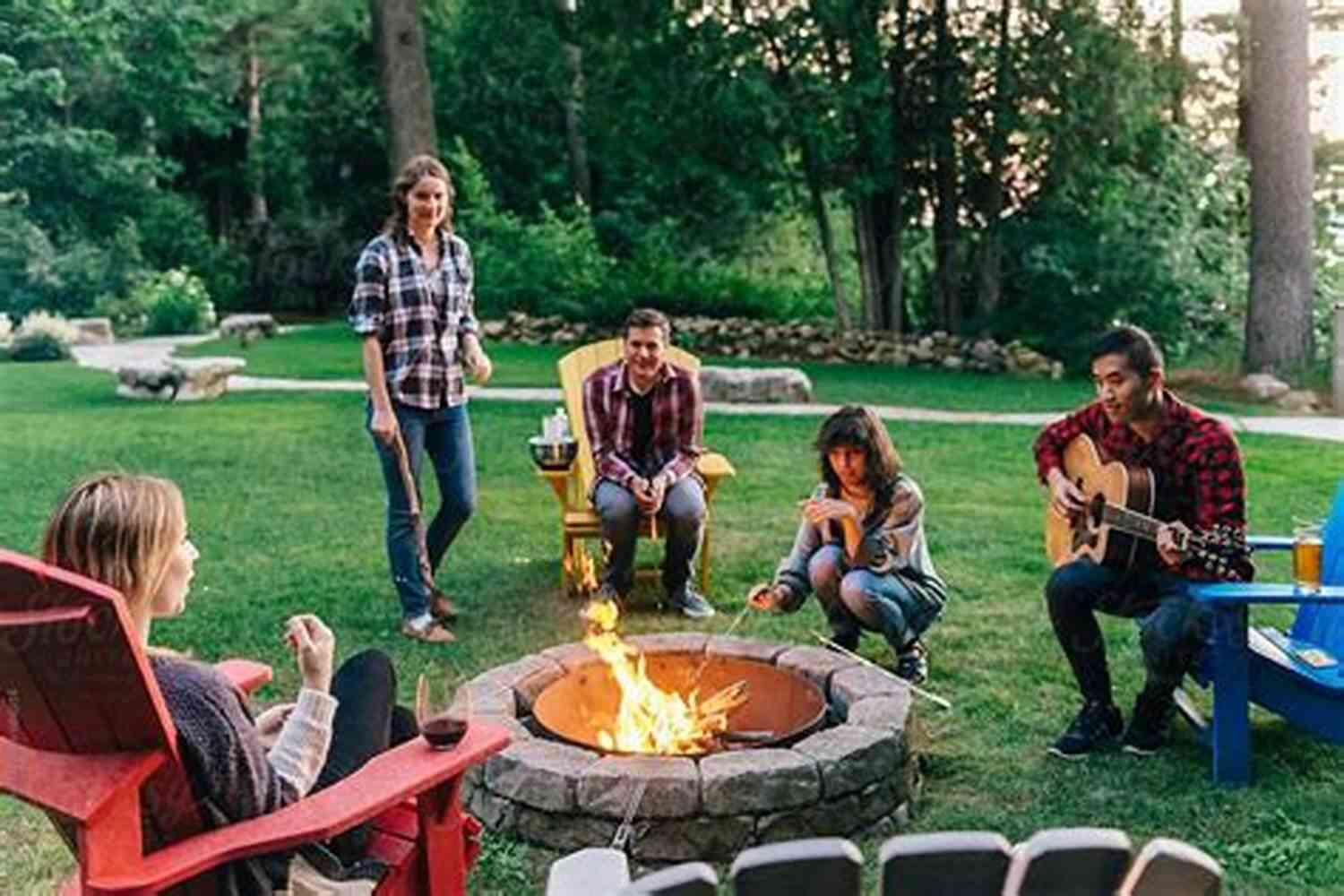 A Joyful Group Of Friends Laughing Around A Campfire Sisters Behaving Badly: The Laugh Out Loud Feel Good Adventure From #1 Author Maddie Please For 2022