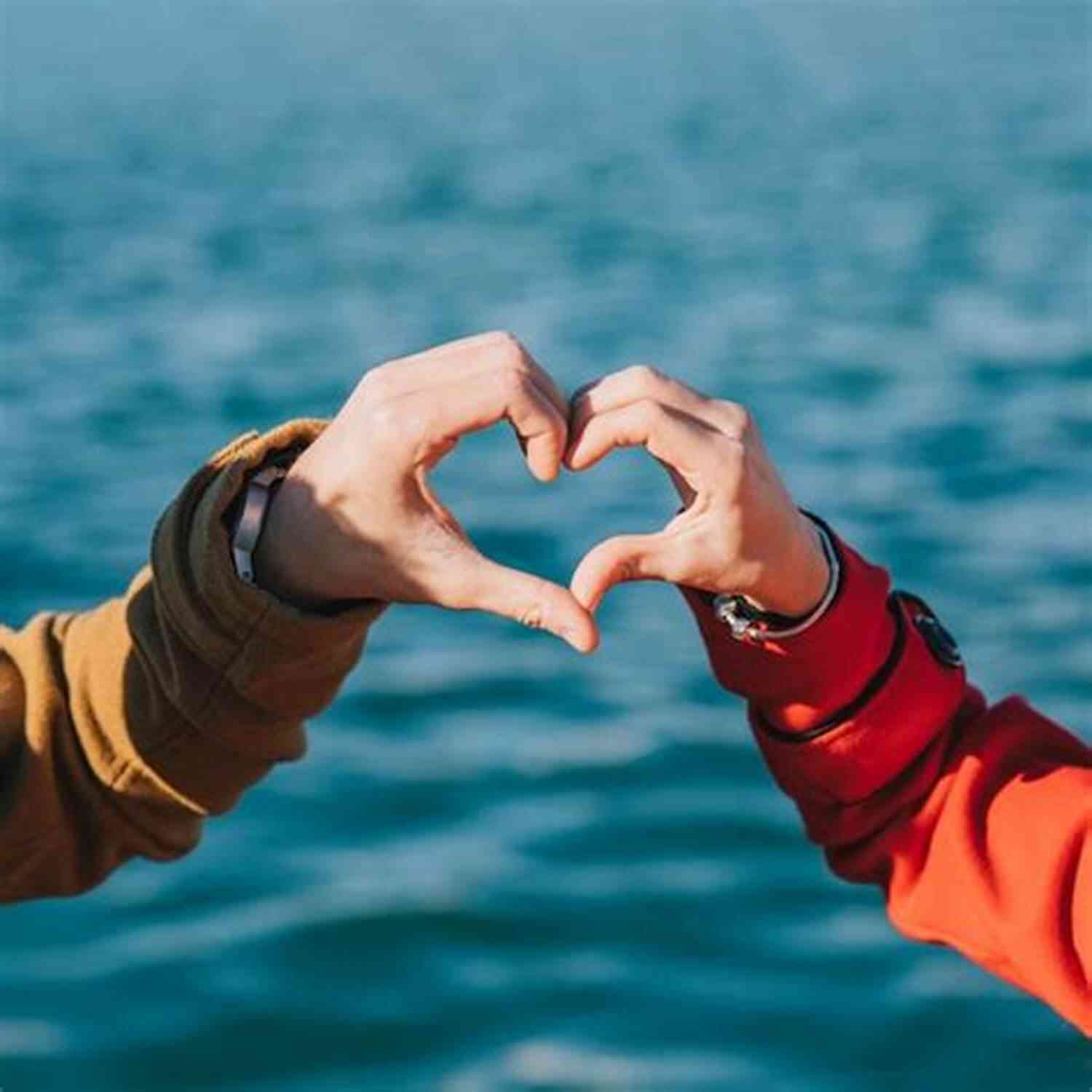 Couple Holding Hands With A Heart Shaped Crack CRACKS: Looking For Special Treatment From The Universe