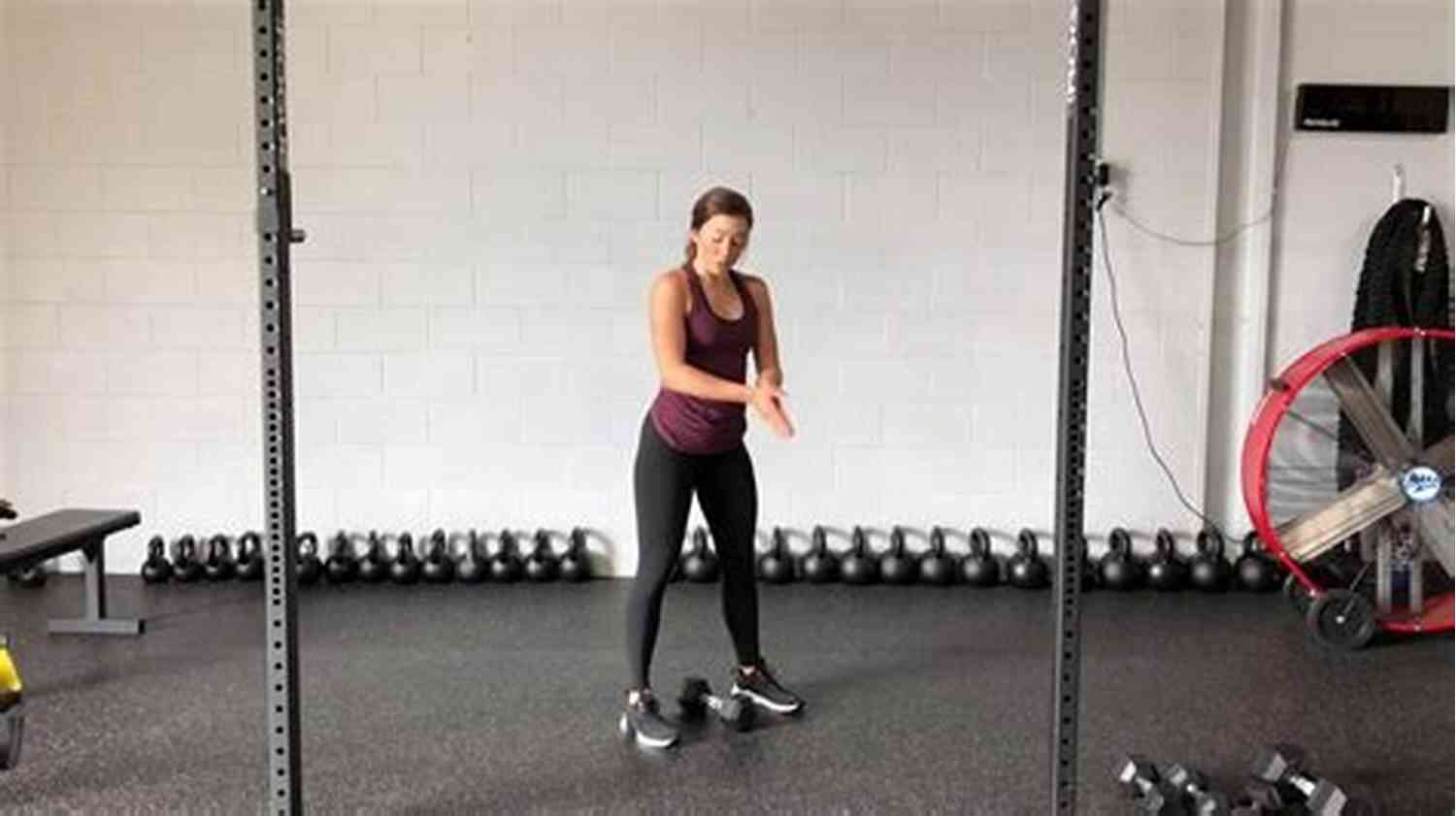Woman Lifting Weights During A Clean Press Workout How To Increase Your Clean Press